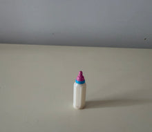 VINTAGE MINIATURE, HARD-PLASTIC BABY BOTTLE ONLY (MAYBE FROM 1990S BARBIE/BABYSITTER SKIPPER SET)