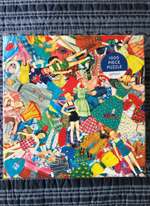 1,000-PIECE PUZZLE WITH RETRO, RAINBOW-COLORED PAPER DOLL COLLAGE