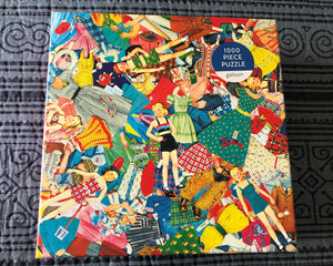 1,000-PIECE PUZZLE WITH RETRO, RAINBOW-COLORED PAPER DOLL COLLAGE