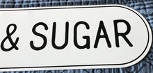 CHARMING, OVAL-EDGED TIN "CREAM & SUGAR" WALL SIGN