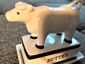 CUTE CREAM-AND-BLACK COW BUTTER DISH