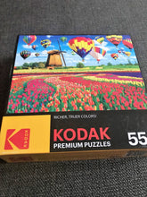 550-PIECE ROMANTIC WINDMILL, HOT AIR BALLOONS, AND TULIPS PUZZLE