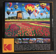 550-PIECE ROMANTIC WINDMILL, HOT AIR BALLOONS, AND TULIPS PUZZLE