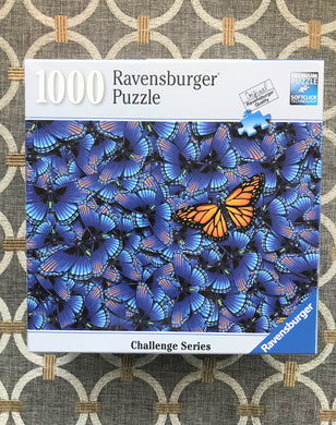 1,000-PIECE BUTTERFLY-THEMED PUZZLE:  BEAUTIFUL BLUE BUTTERFLIES...AND ONE GOLDEN NON-CONFORMIST