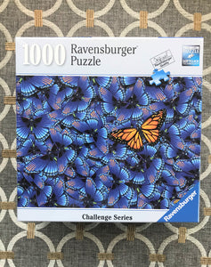 1,000-PIECE BUTTERFLY-THEMED PUZZLE:  BEAUTIFUL BLUE BUTTERFLIES...AND ONE GOLDEN NON-CONFORMIST