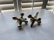 TWO JUMBO, GOLD-ISH CAST-ALUMINUM JACKS (SOLD AS A SET):  FUN DECOR! CAN BE USED AS BOOKENDS