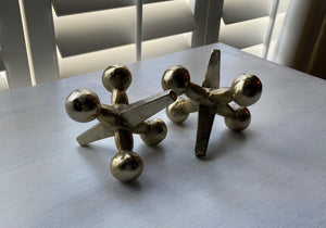 TWO JUMBO, GOLD-ISH CAST-ALUMINUM JACKS (SOLD AS A SET):  FUN DECOR! CAN BE USED AS BOOKENDS