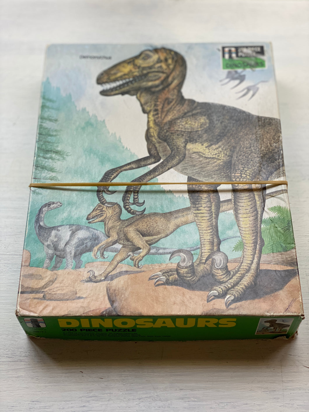 200-PIECE VINTAGE CHILDREN'S DELNONYCHUS  DINOSAUR PUZZLE (THE CUTEST RETRO DECOR FOR A SHELF IN A NURSERY/CHILD'S ROOM)