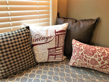 CLASSIC AND CLASSY, BLACK-AND-KHAKI CHECKED THROW PILLOW