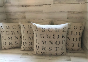 GORGEOUS UPPERCASE ALPHABET LETTERS THROW PILLOW (WITH DISTRESSED, STENCIL-LOOK)