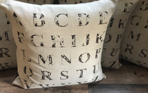 GORGEOUS UPPERCASE ALPHABET LETTERS THROW PILLOW (WITH DISTRESSED, STENCIL-LOOK)