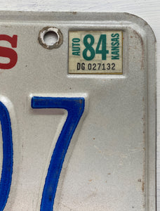 VINTAGE LICENSE PLATE:  1984 KANSAS (STICKER)--RARE/SPECIAL RED, BLUE, AND CREAM NATIONAL GUARD PLATE