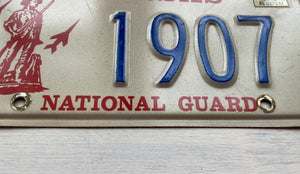 VINTAGE LICENSE PLATE:  1984 KANSAS (STICKER)--RARE/SPECIAL RED, BLUE, AND CREAM NATIONAL GUARD PLATE