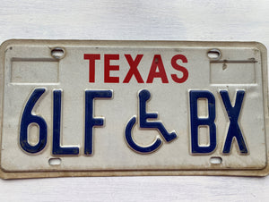 VINTAGE LICENSE PLATE:  TEXAS DISABLED-DRIVER PLATE (RED, CREAM, AND BLUE/HEAVYWEIGHT)
