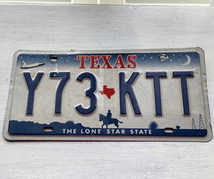 VINTAGE LICENSE PLATE:  TEXAS CLASSIC SYMBOLS PLATE--FROM NASA TO COWBOY AND HORSE TO OIL RIGS