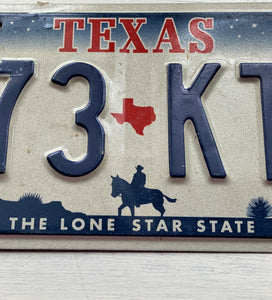 VINTAGE LICENSE PLATE:  TEXAS CLASSIC SYMBOLS PLATE--FROM NASA TO COWBOY AND HORSE TO OIL RIGS