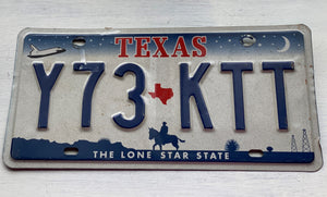 VINTAGE LICENSE PLATE:  TEXAS CLASSIC SYMBOLS PLATE--FROM NASA TO COWBOY AND HORSE TO OIL RIGS