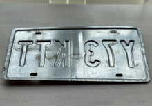 VINTAGE LICENSE PLATE:  TEXAS CLASSIC SYMBOLS PLATE--FROM NASA TO COWBOY AND HORSE TO OIL RIGS