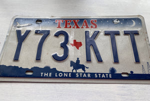 VINTAGE LICENSE PLATE:  TEXAS CLASSIC SYMBOLS PLATE--FROM NASA TO COWBOY AND HORSE TO OIL RIGS