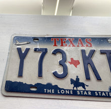 VINTAGE LICENSE PLATE:  TEXAS CLASSIC SYMBOLS PLATE--FROM NASA TO COWBOY AND HORSE TO OIL RIGS